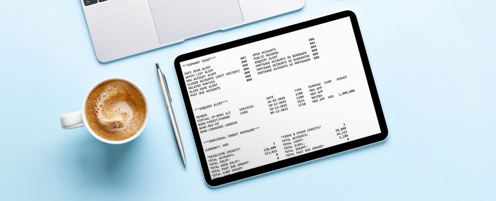 Tablet and smartphone with lite credit report n desk. Top view flat lay